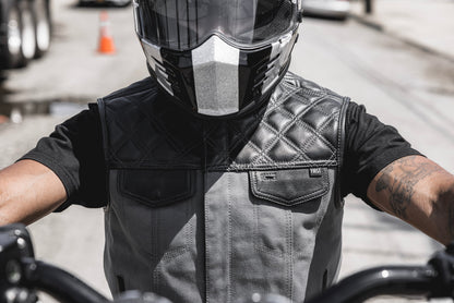 Motorcycle club style, leather and grey canvas vest