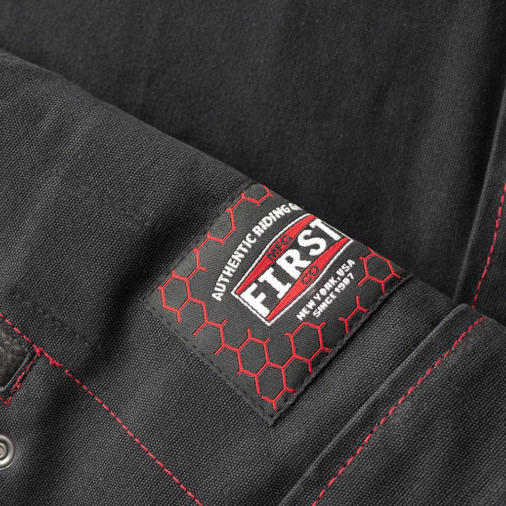 Motorcycle club style leather and black Canvas Vest with red stitching