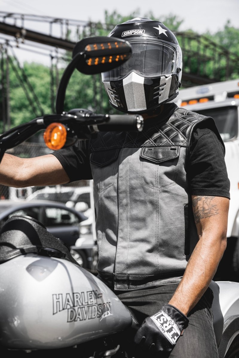 Motorcycle club style, leather and grey canvas vest