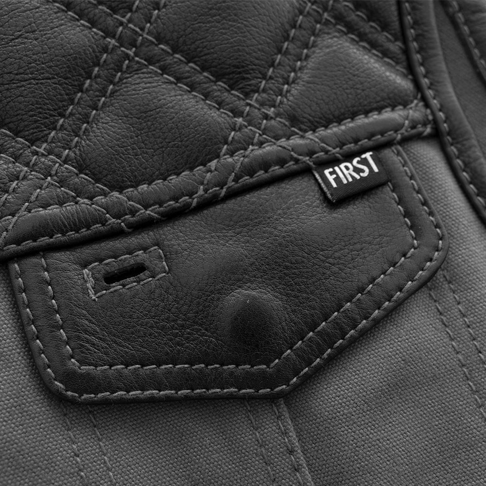 Motorcycle club style, leather and grey canvas vest