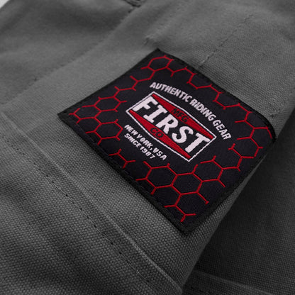 Motorcycle club style, leather and grey canvas vest